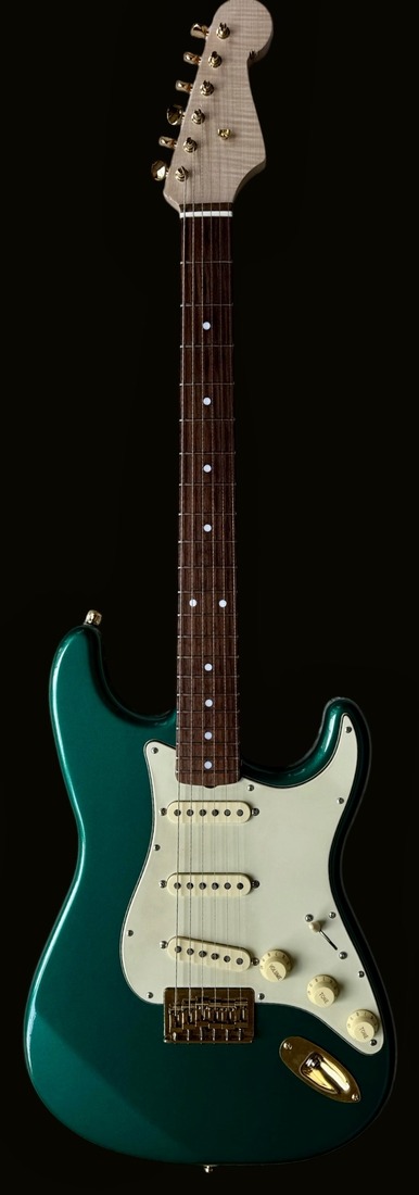 S-style in Sherwood Green, gold hardware, flame maple headstock — front
